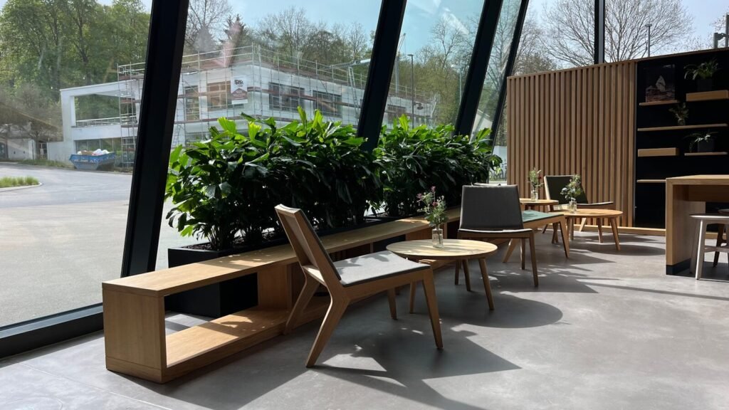 a room filled with furniture and a large window